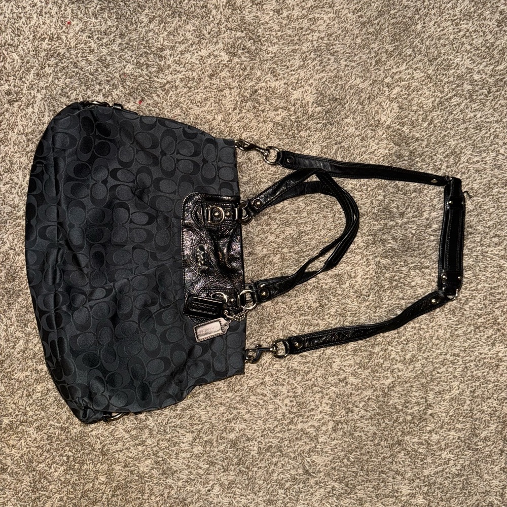 Black Hobo Bag with Textured Fabric and Metal Hardware